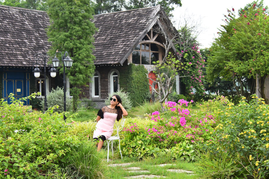 women-sitting-in-the-garden-and-enjoying-her-own-hobby