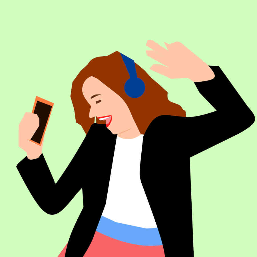 a-passionate-girl-listening-to-music-via-headphone-and-dancing-happily-at-the-same-time.