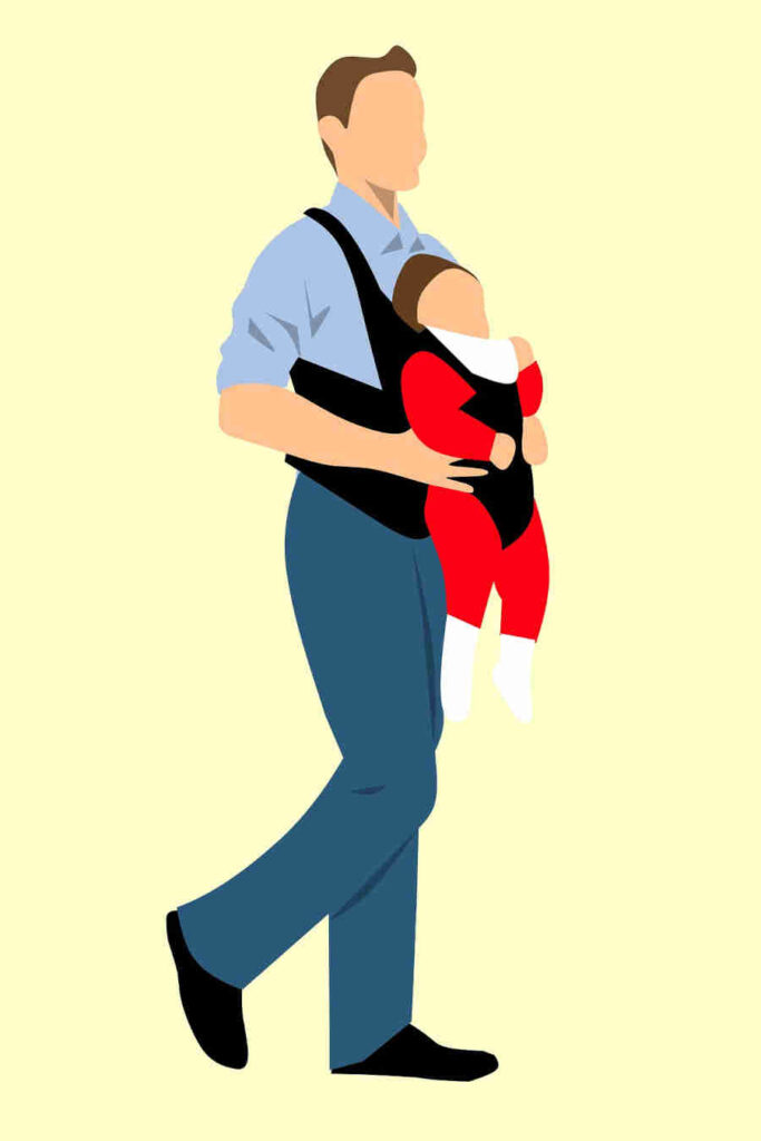 a-young-father-walking-by-holding-child-in-his-hands
